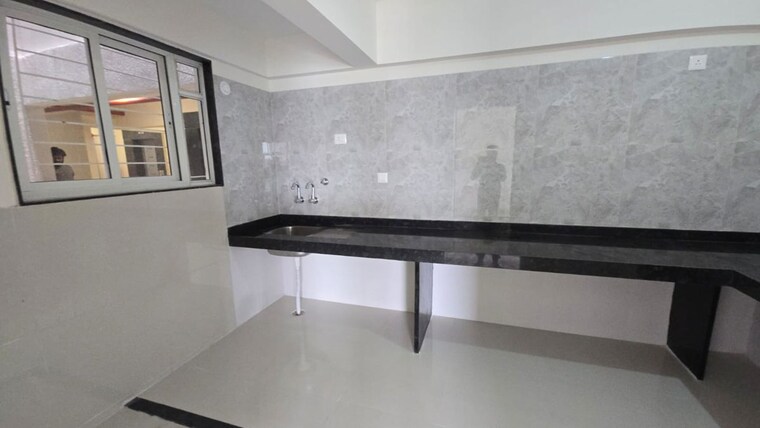 Kitchen, gini-vivante 2 Bedroom 723 Sq.Ft. Apartment In Kiwale Pune 10464954