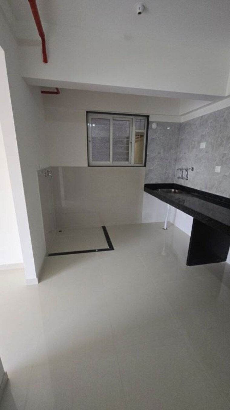 Kitchen, gini-vivante 2 Bedroom 723 Sq.Ft. Apartment In Kiwale Pune 10464954