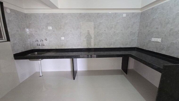 Kitchen, gini-vivante 2 Bedroom 723 Sq.Ft. Apartment In Kiwale Pune 10464954