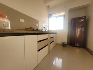 Kitchen in 1 BHK Apartment at Puranik City Reserva, Ghodbunder Road – for Rent