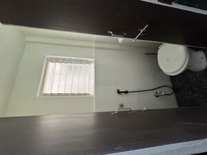 Bathroom in 2 BHK Apartment at Tejas Trupti Kunj, Narhe – for Sale