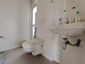Bathroom in 3 BHK Apartment at Godrej Emerald, Ghodbunder Road – for Rent