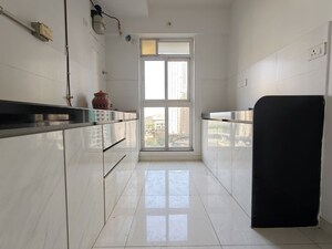 Kitchen in 3 BHK Apartment at Godrej Emerald, Ghodbunder Road – for Rent