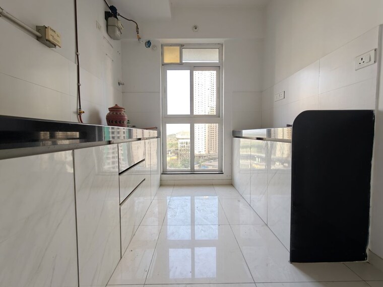 Kitchen, godrej-emerald 3 Bedroom 927 Sq.Ft. Apartment In Ghodbunder Road Thane 10466241