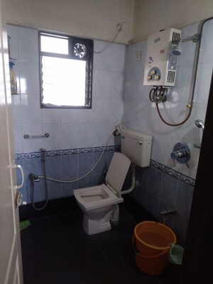 Bathroom in 2 BHK Apartment at Paranjape Schemes Royal Court, Andheri East – for Rent