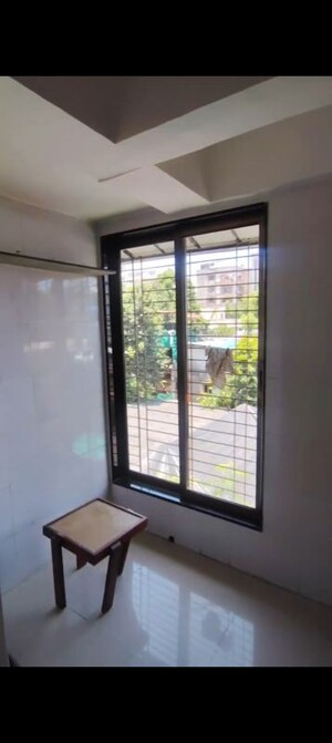 Room in 2 BHK Apartment at Ashish CHS Vile Parle West, Vile Parle West – for Rent