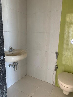 Bathroom in 3 BHK Apartment at M R Galaxy Royale, Goregaon West – for Rent