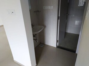 Bathroom in 2 BHK Apartment at Alfa Life Scapes, Wagholi – for Rent