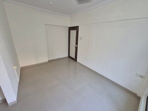 Bedroom in 1 BHK Apartment at Neelgaga Apartment, Andheri West – for Rent
