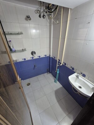 Bathroom in 1 BHK Apartment at Neelgaga Apartment, Andheri West – for Rent
