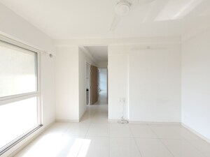 Building Lobby in 1.5 BHK Apartment at Godrej Emerald, Ghodbunder Road – for Rent