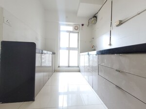 Kitchen in 1.5 BHK Apartment at Godrej Emerald, Ghodbunder Road – for Rent