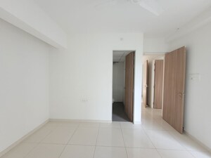 Building Lobby in 1.5 BHK Apartment at Godrej Emerald, Ghodbunder Road – for Rent