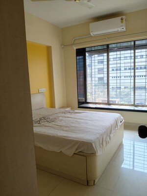 Bedroom in 1 BHK Apartment at Samarth Ashish CHS, Andheri West – for Rent