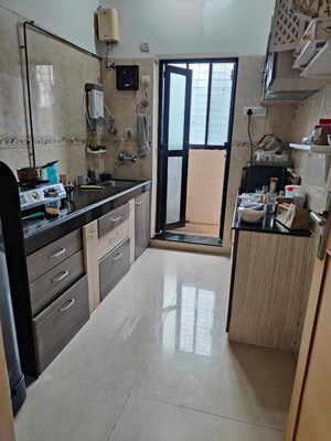 Kitchen in 2 BHK Apartment at K Raheja Heights, Malad East – for Rent