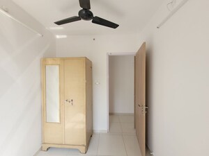Building Lobby in 1.5 BHK Apartment at Godrej Emerald, Ghodbunder Road – for Rent