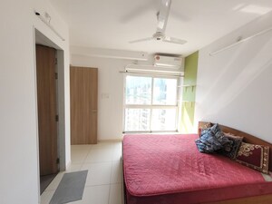 Bedroom in 1.5 BHK Apartment at Godrej Emerald, Ghodbunder Road – for Rent