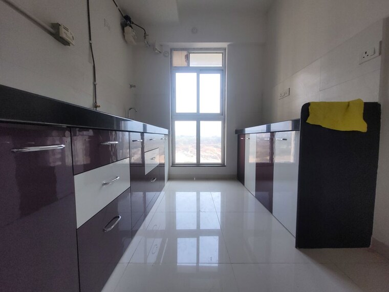 Kitchen, godrej-emerald 2 Bedroom 727 Sq.Ft. Apartment In Ghodbunder Road Thane 10466721