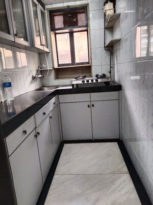 Kitchen in 1 BHK Apartment at Garden Colony, Mahim – for Rent