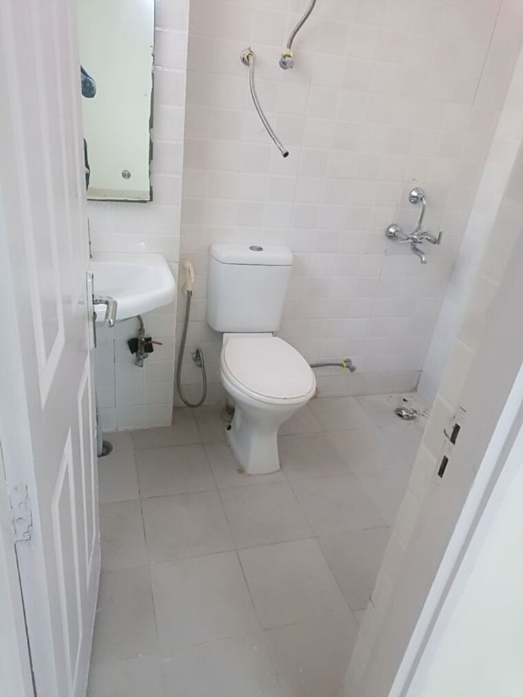 Bathroom, unitech-woodstock-floors 2 Bedroom 1200 Sq.Ft. Apartment In Sector 50 Gurgaon 10466821