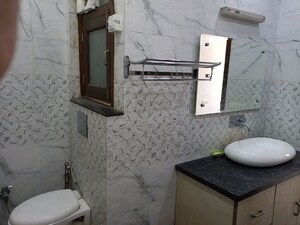 Bathroom in 3 BHK Apartment at Panchsheel Vihar – for Rent