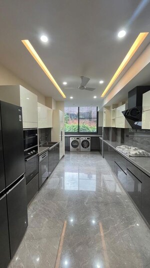 Kitchen in 4 BHK Builder Floor at Sushant Lok I – for Sale