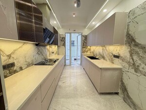 Kitchen in 4 BHK Builder Floor at Sushant Lok I – for Sale