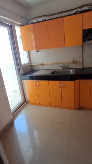 Kitchen in 3 BHK Apartment at Ramprastha City The Edge Towers, Sector 37d – for Rent