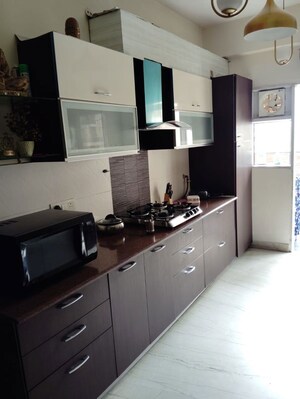 Kitchen in 4 BHK Apartment at Exotica Fresco, Sector 137 – for Sale