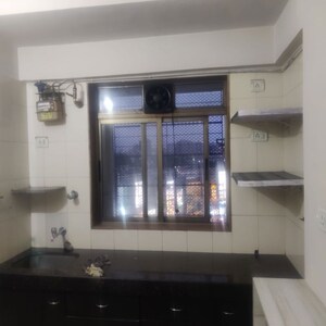 Kitchen in 2 BHK Apartment at Yashodham Complex, Goregaon East – for Sale