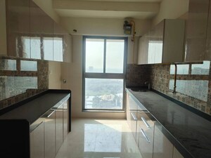 Kitchen in 2 BHK Apartment at Raj Infinia, Malad West – for Rent