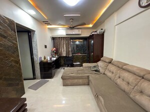 Living Room in 2 BHK Apartment at Shubham Bhavatu CHS, Kandivali West – for Sale