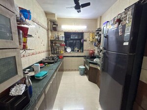 Kitchen in 2 BHK Apartment at Shubham Bhavatu CHS, Kandivali West – for Sale