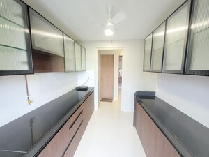 Kitchen in 3 BHK Apartment at Godrej Emerald, Ghodbunder Road – for Rent