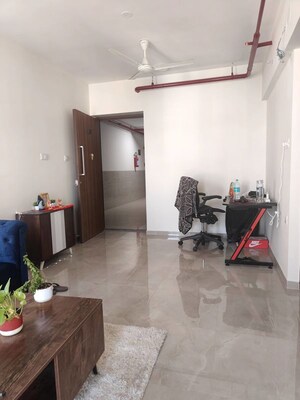 Living Room in 1 BHK Apartment at Sheth Irene, Malad West – for Rent