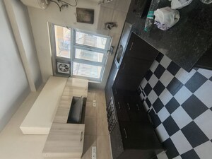 Kitchen in 3 BHK Builder Floor at Ansal API Esencia, Sector 67 – for Rent