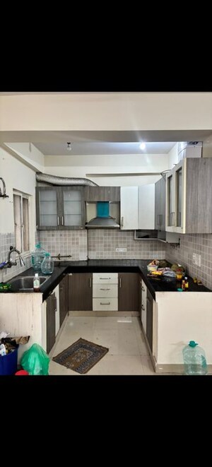 Kitchen in 4 BHK Apartment at Aditya Urban Casa, Sector 78 – for Rent