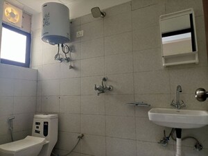 Bathroom in 2 BHK Apartment at Bedarwals Sixty Three Golf Drive, Sector 63 – for Rent