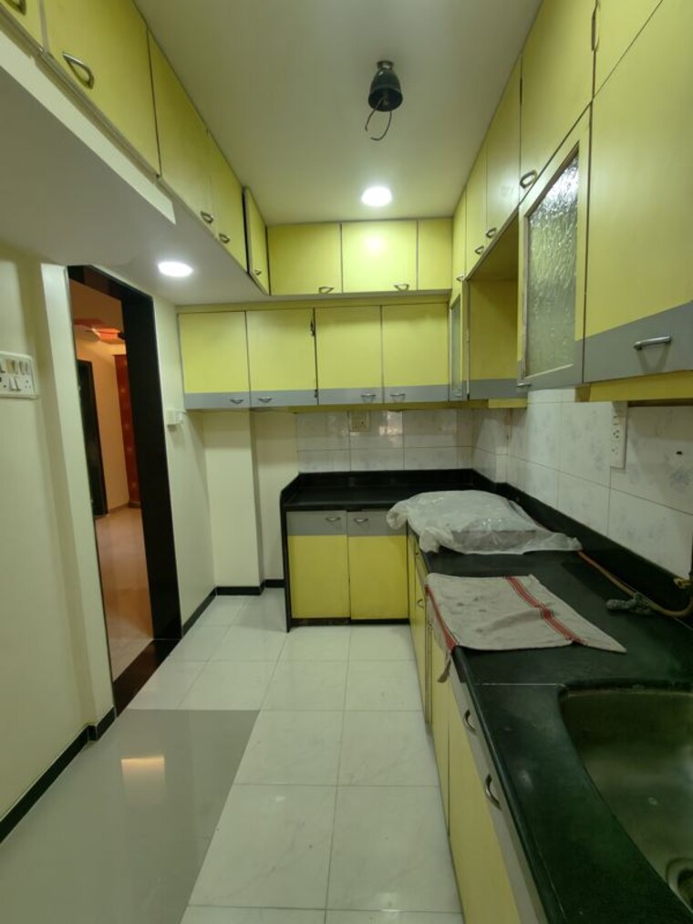 Kitchen, dosti-maitri-gardens 2 Bedroom 750 Sq.Ft. Apartment In Pokhran Road No Two Thane 10467232