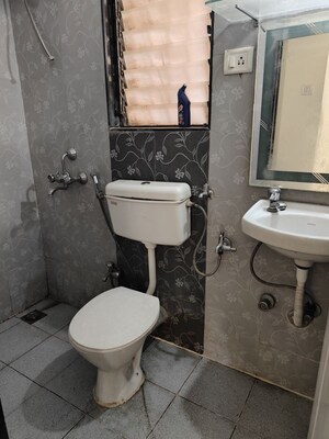Bathroom in 2 BHK Apartment at Hubtown Greenwoods B Wing, Vartak Nagar – for Rent