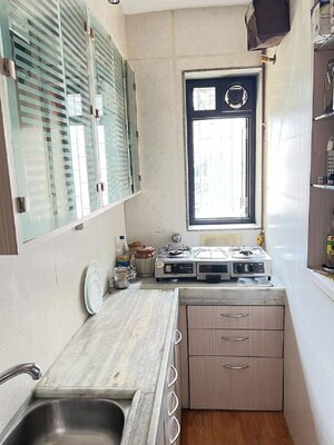 Kitchen in 1.5 BHK Apartment at Bandra West – for Rent