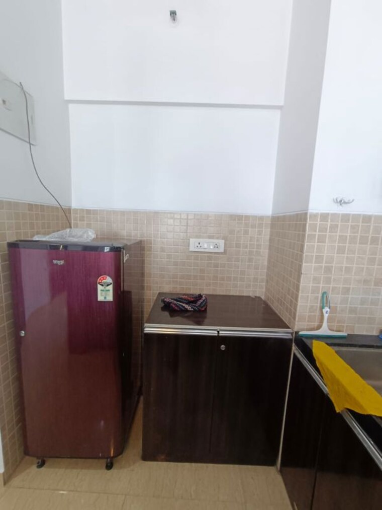 Kitchen, lodha-belmondo-st-andrews-b-c-d-villa-1-to-28 1 Bedroom 700 Sq.Ft. Apartment In Gahunje Pune 10467327