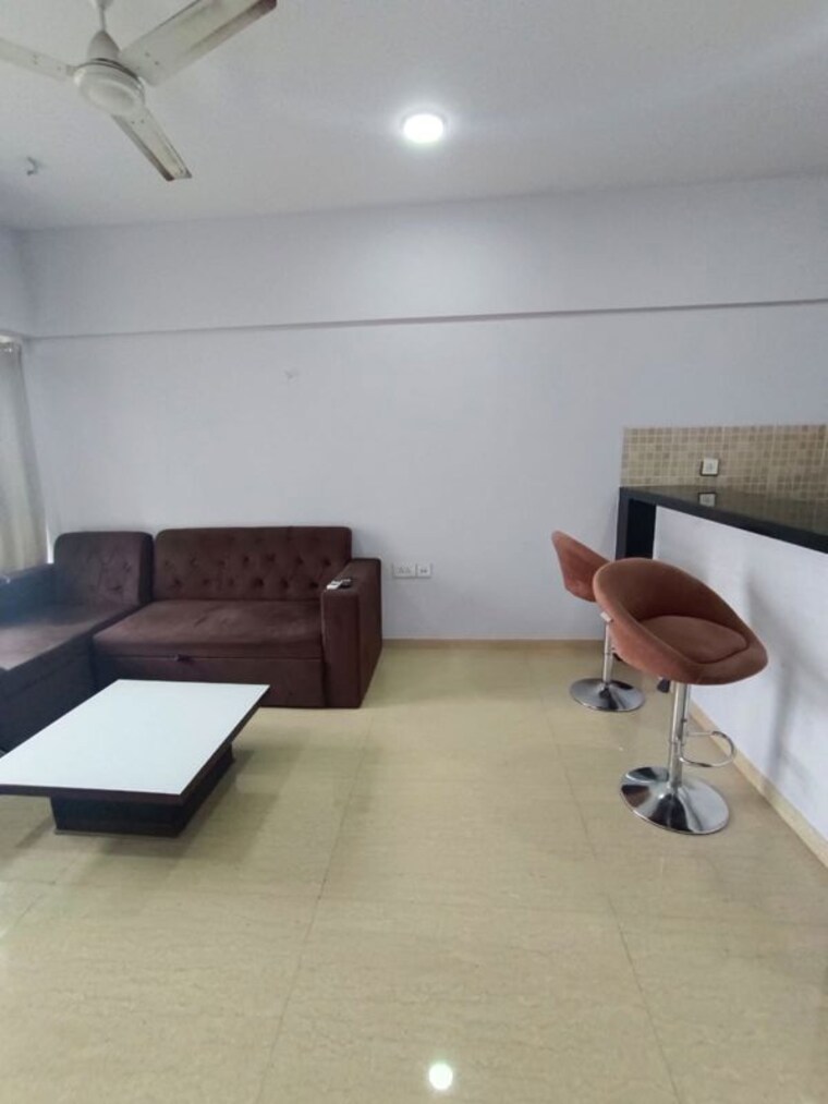 Living Room, lodha-belmondo-st-andrews-b-c-d-villa-1-to-28 1 Bedroom 780 Sq.Ft. Apartment In Gahunje Pune 10467337
