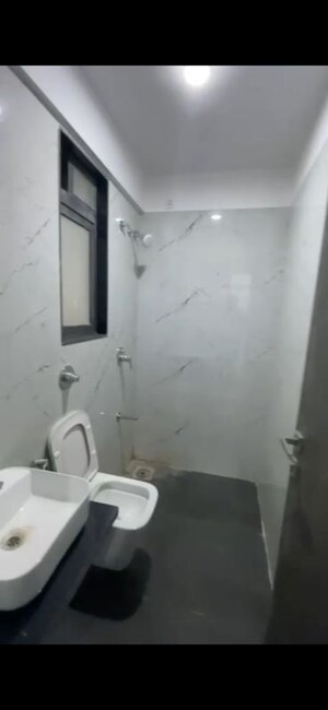 Bathroom in 2 BHK Apartment at Dev Leo Tower, Oshiwara – for Rent