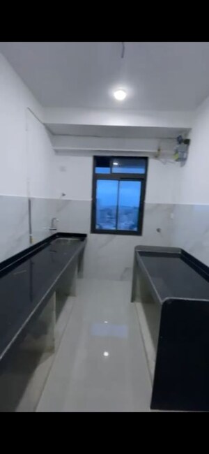 Kitchen in 2 BHK Apartment at Dev Leo Tower, Oshiwara – for Rent