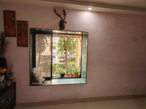 Room in 2 BHK Apartment at Om Shri Yashodhan CHS, Goregaon East – for Rent