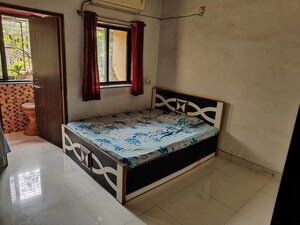 Bedroom in 2 BHK Apartment at Om Shri Yashodhan CHS, Goregaon East – for Rent