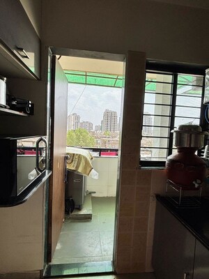 Kitchen in 2 BHK Apartment at Jivraj Park – for Sale