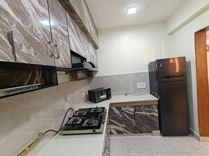 Kitchen in 3 BHK Apartment at Eros Sampoornam, Sector 2 Greater Noida – for Rent