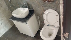 Bathroom in 3 BHK Apartment at Samridhi Daksh Avenue, Sector 150 – for Rent